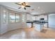 Bright dining area leading to the kitchen with large windows and outdoor view at 3524 E Derringer Way, Gilbert, AZ 85297