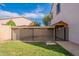 Spacious, fenced-in dog run provides a secure area for pets at 3524 E Derringer Way, Gilbert, AZ 85297