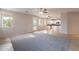 Bright and airy living area with access to the backyard and open kitchen at 3524 E Derringer Way, Gilbert, AZ 85297