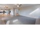 Open concept living space with tile flooring and plenty of natural light at 3524 E Derringer Way, Gilbert, AZ 85297
