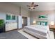 Beautiful main bedroom with tasteful decor, art, and natural light, creating a relaxing and stylish retreat at 3524 E Derringer Way, Gilbert, AZ 85297