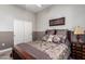 Comfortable bedroom featuring a full-sized bed, ceiling fan, and carpet at 3562 E Harvard Ct, Gilbert, AZ 85234