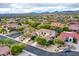 Expansive aerial view of a neighborhood nestled in a desert landscape with stunning mountain views at 4122 E Burnside Trl, Cave Creek, AZ 85331