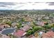 An expansive neighborhood from above, exhibiting a blend of houses amidst desert landscapes and native flora at 4122 E Burnside Trl, Cave Creek, AZ 85331