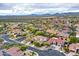 Aerial view of a residential neighborhood showcasing houses with mature landscaping and desert scenery at 4122 E Burnside Trl, Cave Creek, AZ 85331