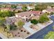 Beautiful aerial view of the home featuring desert landscaping, mature trees and a neighborhood view at 4122 E Burnside Trl, Cave Creek, AZ 85331