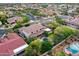 Elevated view of a residential home, complete with a refreshing pool and mature trees at 4122 E Burnside Trl, Cave Creek, AZ 85331