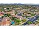 Serene aerial view of houses nestled in desert landscape with pristine blue pools, enhanced privacy, and scenic mountain backdrop at 4122 E Burnside Trl, Cave Creek, AZ 85331