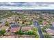 Expansive aerial view of a desert community showcasing beautiful homes and stunning mountain views in the distance at 4122 E Burnside Trl, Cave Creek, AZ 85331