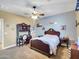 This bedroom features a dark wood bedroom set and desk at 4122 E Burnside Trl, Cave Creek, AZ 85331