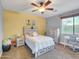 Bedroom includes a bright yellow wall with light wood furniture at 4122 E Burnside Trl, Cave Creek, AZ 85331