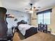 Charming bedroom featuring neutral carpet flooring and ceiling fan fixture at 4122 E Burnside Trl, Cave Creek, AZ 85331