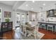 Cozy dining area with a view of the outdoors and a modern kitchen nearby at 4122 E Burnside Trl, Cave Creek, AZ 85331