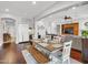 An inviting dining area with hardwood floors connects to the living area, creating a cohesive entertaining space at 4122 E Burnside Trl, Cave Creek, AZ 85331