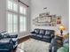 Cozy living room featuring lots of natural light, hardwood floors, and comfortable seating at 4122 E Burnside Trl, Cave Creek, AZ 85331