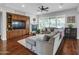 Cozy living room showcases a fireplace, built-in shelving, and a large sectional for comfortable seating at 4122 E Burnside Trl, Cave Creek, AZ 85331