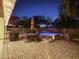 Inviting patio with a dining set and umbrella next to a pool, perfect for outdoor enjoyment at 4122 E Burnside Trl, Cave Creek, AZ 85331