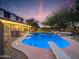 Inviting pool and spa with a diving board, surrounded by mature trees and a private yard at 4122 E Burnside Trl, Cave Creek, AZ 85331