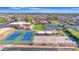 An aerial view of the community clubhouse featuring tennis and shuffleboard courts at 4720 E Flossmoor Cir, Mesa, AZ 85206