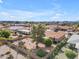 Beautiful backyard featuring desert landscaping with a mature shade tree and brick fence at 4720 E Flossmoor Cir, Mesa, AZ 85206