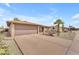 Inviting front exterior with desert landscaping, private front porch, and two-car garage at 4720 E Flossmoor Cir, Mesa, AZ 85206