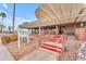 Charming restaurant entrance with red-striped steps and a welcoming atmosphere for dining experiences at 4720 E Flossmoor Cir, Mesa, AZ 85206