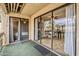 Covered balcony featuring glass doors to the interior and great natural light at 4950 N Miller Rd # 231, Scottsdale, AZ 85251