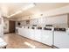 Clean laundry facility featuring rows of modern washing machines and ample space at 4950 N Miller Rd # 231, Scottsdale, AZ 85251