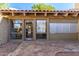 Secure mailboxes with adjacent community information area near red brick walkway at 4950 N Miller Rd # 231, Scottsdale, AZ 85251