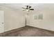 Bedroom featuring a ceiling fan, neutral carpet, and a window at 501 E Hermosa Dr, Tempe, AZ 85282