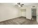 Bedroom with neutral carpet, a ceiling fan, and a closet at 501 E Hermosa Dr, Tempe, AZ 85282