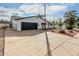 Single-story home with driveway leading to garage, desert landscaping and an enclosed private yard at 501 E Hermosa Dr, Tempe, AZ 85282