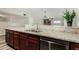 View of granite countertops and stainless steel sink, faucet, and dishwasher at 501 E Hermosa Dr, Tempe, AZ 85282