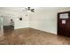 Spacious living room with tile flooring, ample natural light and white wainscotting at 501 E Hermosa Dr, Tempe, AZ 85282