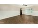 Bright living room featuring neutral tones, tile flooring, and a large window for ample natural light at 501 E Hermosa Dr, Tempe, AZ 85282