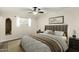 Cozy main bedroom features a comfortable bed, soft lighting, and neutral decor at 501 E Hermosa Dr, Tempe, AZ 85282