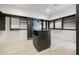 Spacious walk-in closet featuring custom shelving, drawers, and an island for organization at 510 E Woburn Ln, Phoenix, AZ 85085