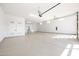 Oversized garage with epoxy flooring, overhead lighting, and built in storage at 510 E Woburn Ln, Phoenix, AZ 85085