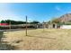 Spacious backyard featuring a large lawn, providing ample space for outdoor activities and relaxation at 5501 E Camelback Rd, Phoenix, AZ 85018