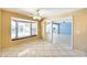 Dining area with beautiful tile floors, a bay window, and access to the backyard pool at 5501 E Camelback Rd, Phoenix, AZ 85018