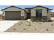 Charming single-Gathering home with a two-car garage and desert landscaping at 5508 N 192Nd Ave, Litchfield Park, AZ 85340