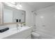 A full bathroom with tub, shower, modern vanity and large mirror at 5853 E Thomas Rd, Scottsdale, AZ 85251