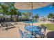 The community pool area is equipped with chairs and tables for you to enjoy a day of relaxation and sunshine at 5853 E Thomas Rd, Scottsdale, AZ 85251