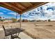 Tranquil covered patio with backyard view at 8431 W Planada Ln, Peoria, AZ 85383