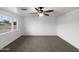 Bedroom featuring a ceiling fan and a large window, perfect for relaxing and unwinding at 901 W 16Th St, Tempe, AZ 85281