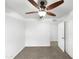 Bedroom featuring plush carpet flooring, ceiling fan, and closet, offering a cozy retreat at 901 W 16Th St, Tempe, AZ 85281