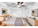 Comfortable bedroom with a ceiling fan, plush carpet, and modern decor for a cozy atmosphere at 901 W 16Th St, Tempe, AZ 85281