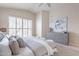 Comfortable main bedroom featuring soft carpet, high ceilings, and abundant natural light from a window at 9113 N 116Th Way, Scottsdale, AZ 85259