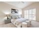 Serene main bedroom featuring plush carpet, shutters, and neutral decor at 9113 N 116Th Way, Scottsdale, AZ 85259