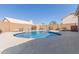 Beautiful sparkling pool, block wall, and hot tub; perfect for cooling off on hot summer days at 9116 W Acoma Dr, Peoria, AZ 85381